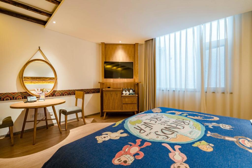 Postel nebo postele na pokoji v ubytování Yoba Boutique Hotel