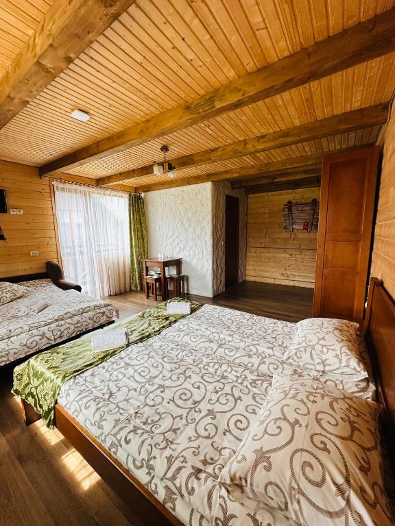 Postel nebo postele na pokoji v ubytování Guest House Lileya