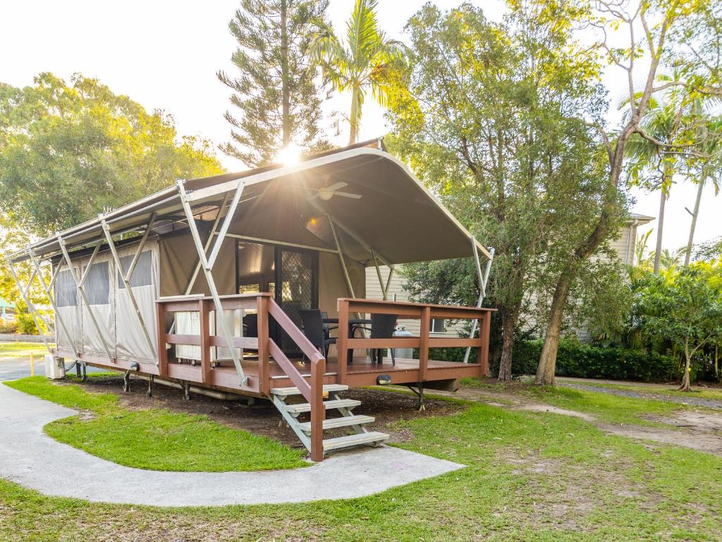 a tiny house with a canopy in a park at NRMA Treasure Island Holiday Resort in Gold Coast