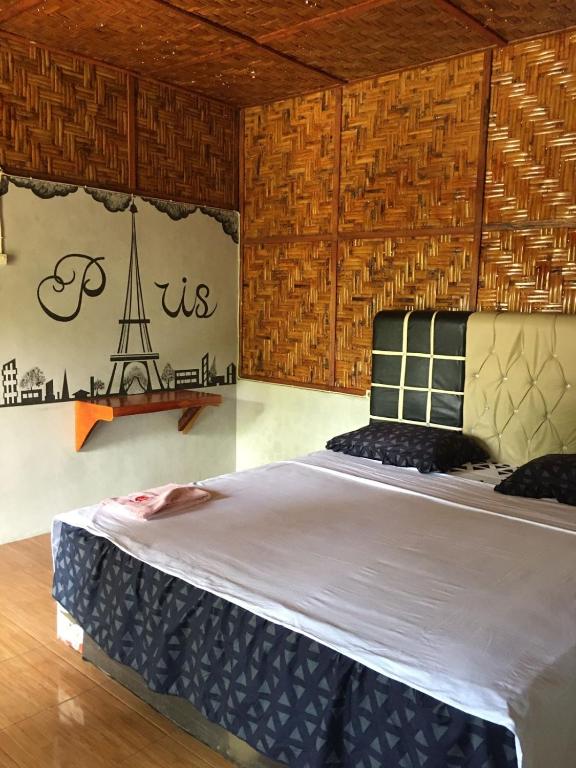 Postel nebo postele na pokoji v ubytování Asim Paris Guesthouse & jungle trekking