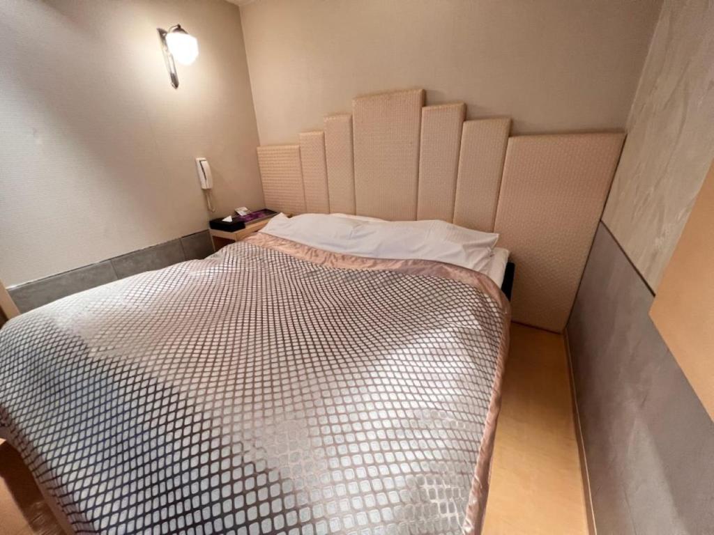 Katil atau katil-katil dalam bilik di Hotel Opus -Adult only-