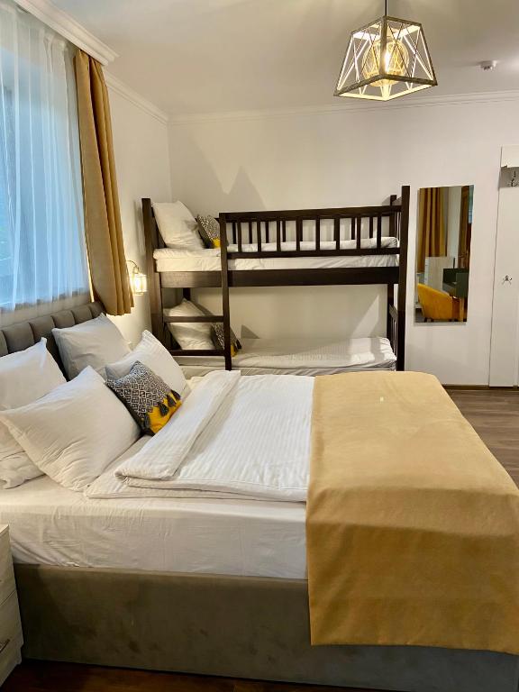 Postel nebo postele na pokoji v ubytování Aurelia Hotel & Restaurant