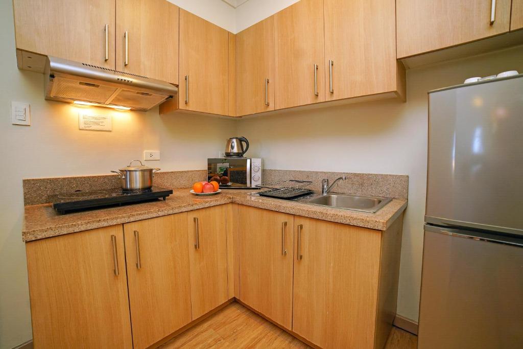 Cuina o zona de cuina de One Pacific Place Serviced Residences