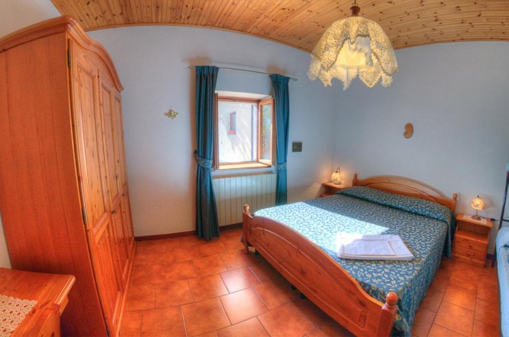 Postel nebo postele na pokoji v ubytování Appartamenti De Sanctis