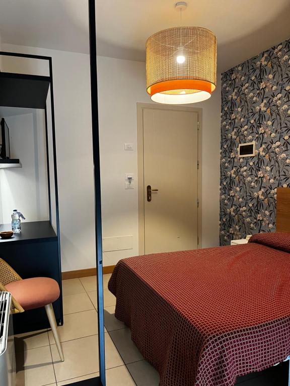 Postel nebo postele na pokoji v ubytování Hotel Majorca sul Mare in centro a Riccione