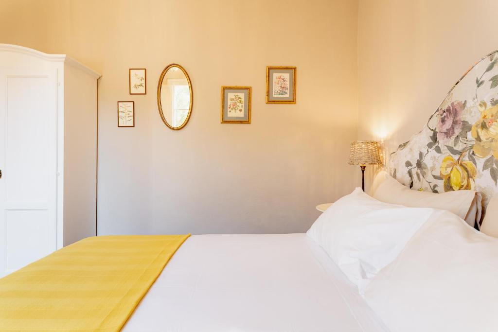 Postel nebo postele na pokoji v ubytování B&B La Casetta