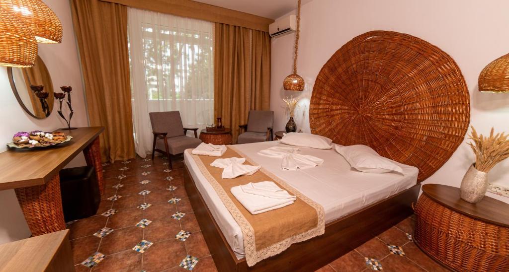 Postel nebo postele na pokoji v ubytování Hotel 2D Resort and Spa