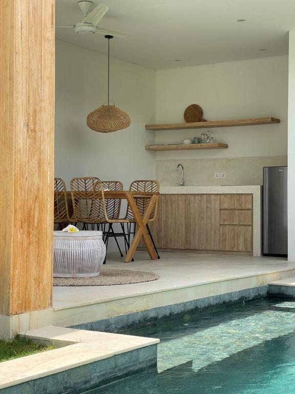 Piscina a Kalea Villas o a prop