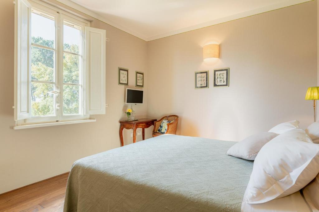 Postel nebo postele na pokoji v ubytování B&B La Casetta
