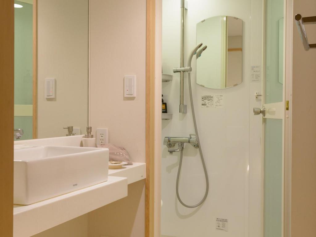 Koupelna v ubytování Ryokan Kohro