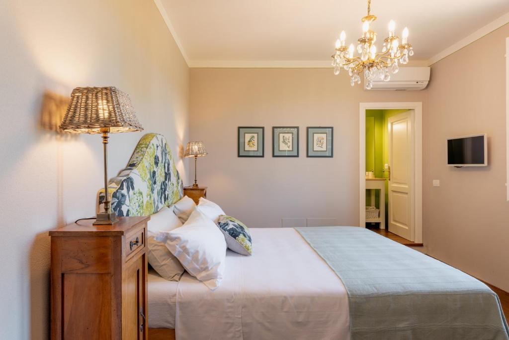 Postel nebo postele na pokoji v ubytování B&B La Casetta
