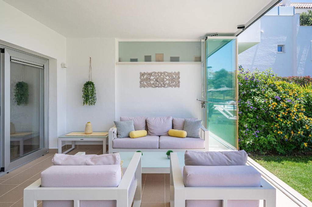 Posezení v ubytování Garten Appartment in La Floresta - La Mairena
