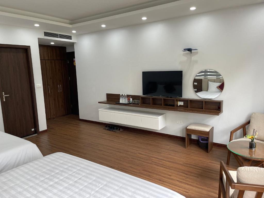 TV a/nebo společenská místnost v ubytování Trung Đức Homestay