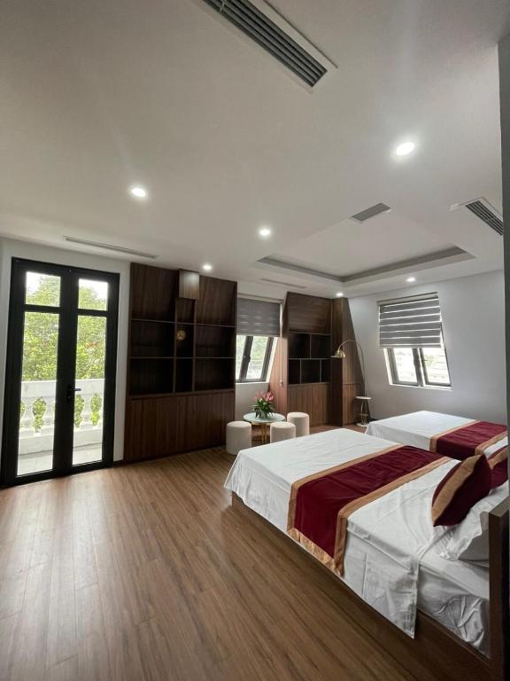 Postel nebo postele na pokoji v ubytování Trung Đức Homestay