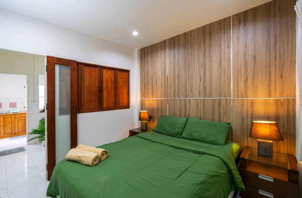 Postel nebo postele na pokoji v ubytování Village Studio ST2