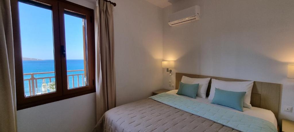 Postel nebo postele na pokoji v ubytování Simon Sea View