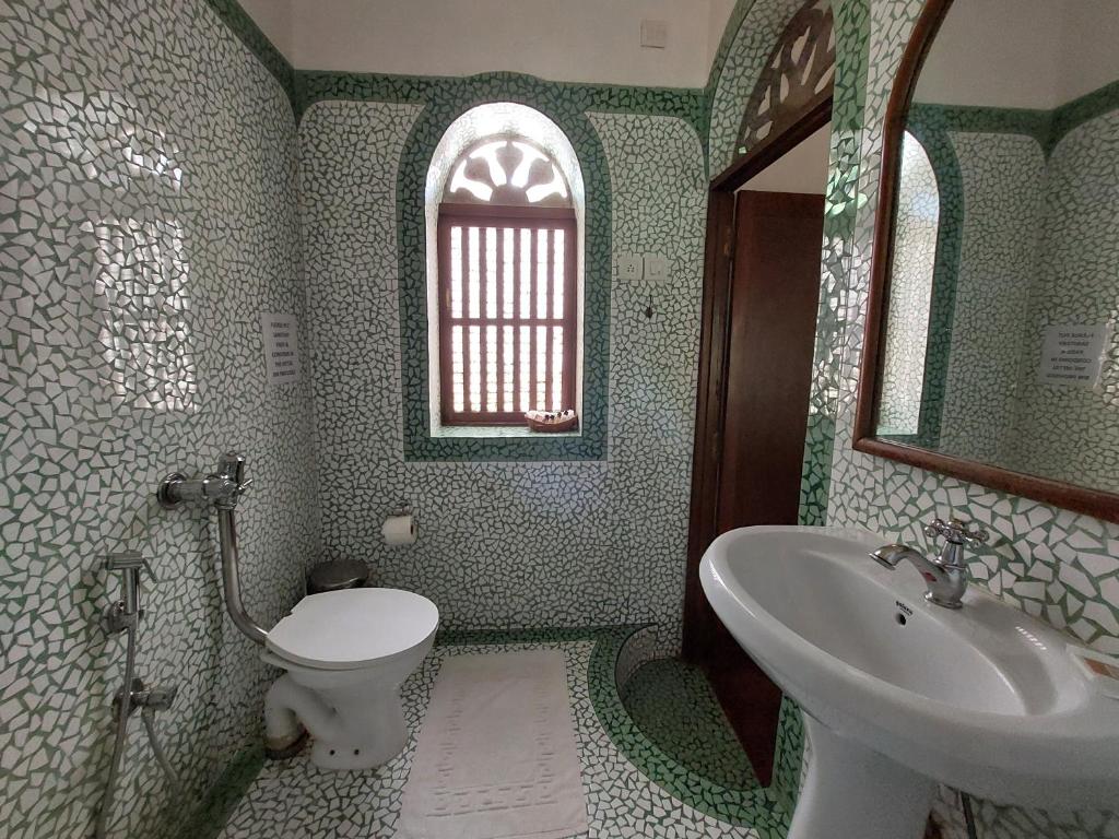 Ванная комната в Marbella Guest House