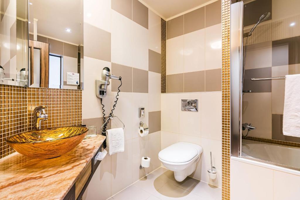 Koupelna v ubytování Hotel Savannah