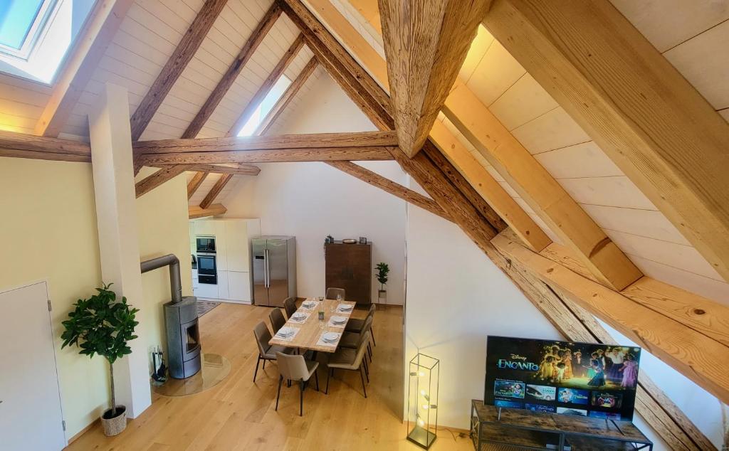 TV a/nebo společenská místnost v ubytování Niesen Loft