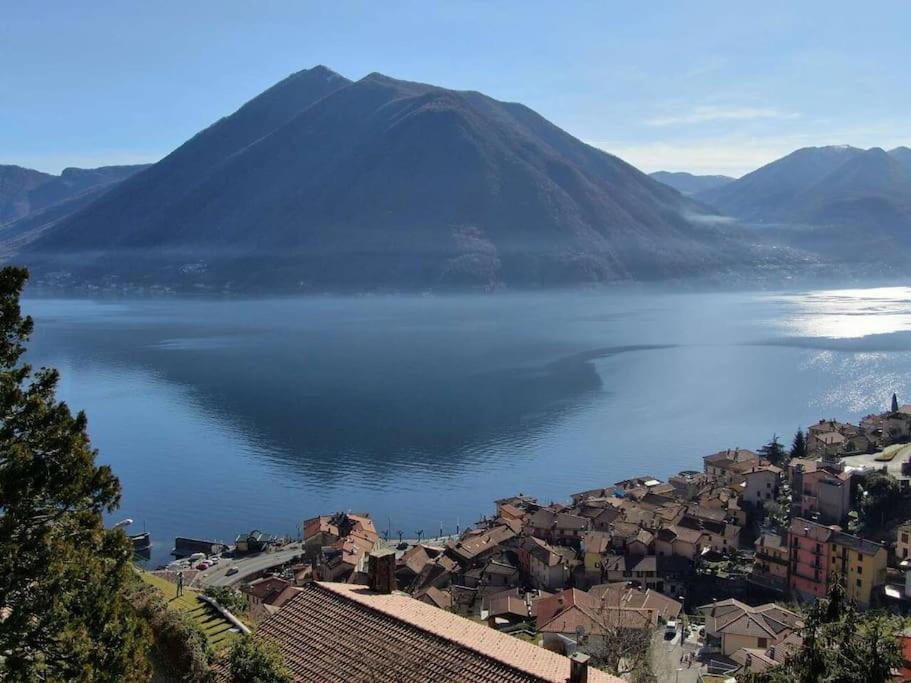 a view of a large body of water with a mountain at Villa San Sisinnio Argegno in Argegno