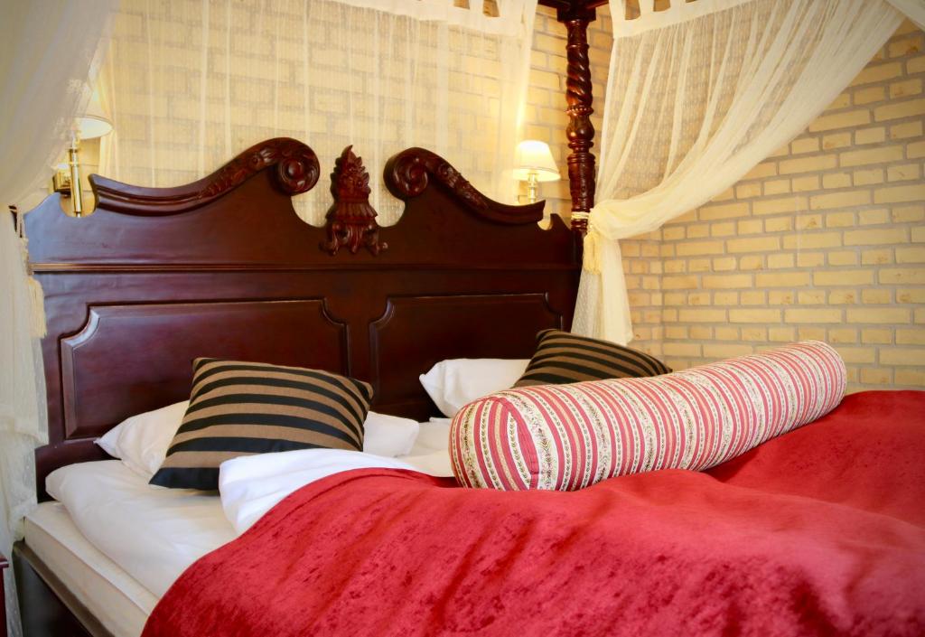 Postel nebo postele na pokoji v ubytování Hotel Amerika