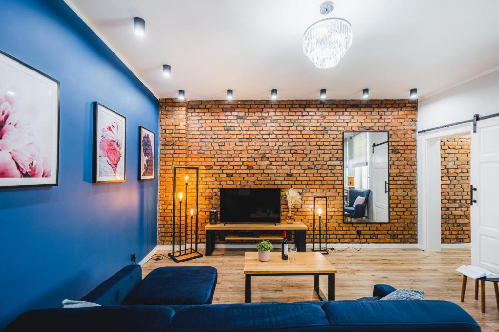 Televízia a/alebo spoločenská miestnosť v ubytovaní Modern Apartments Toruń 4 Stare Miasto-Centrum