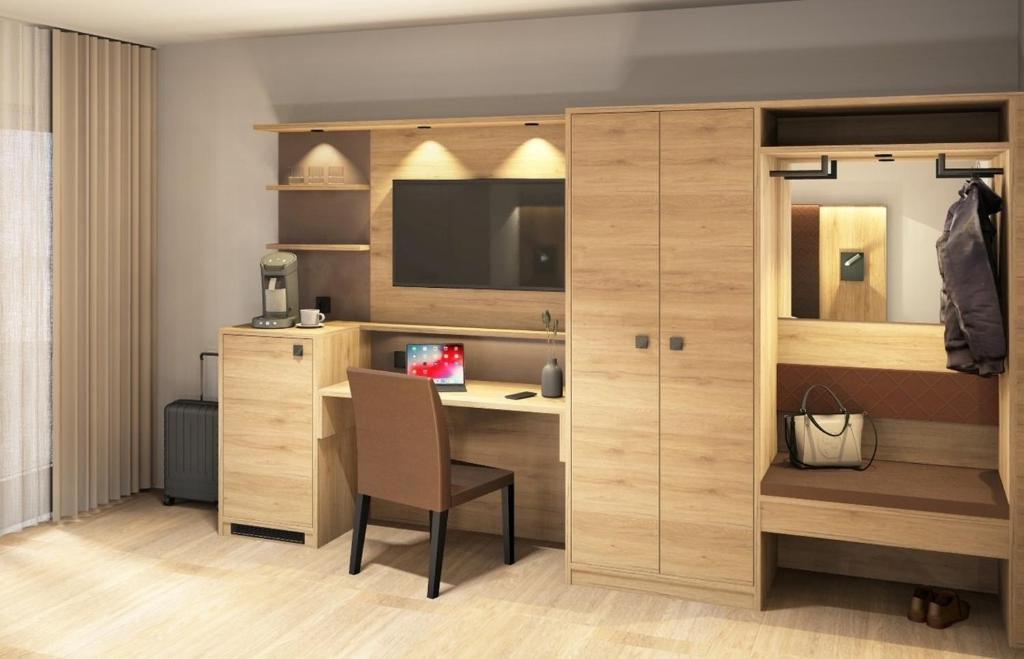 Postel nebo postele na pokoji v ubytování Hotel Charlotte