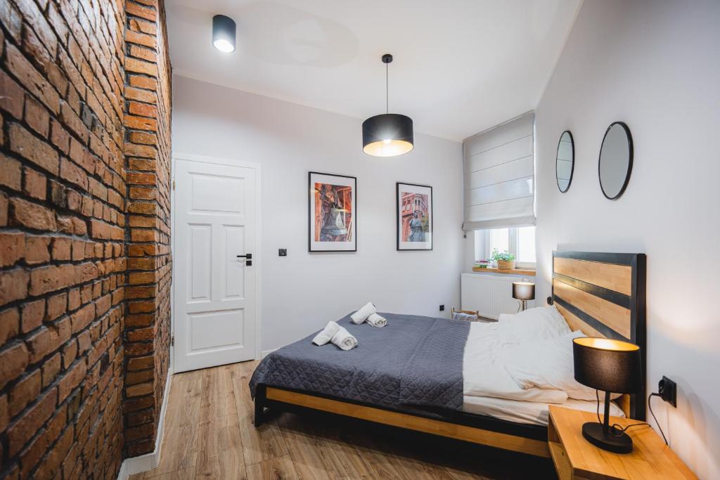 Posteľ alebo postele v izbe v ubytovaní Modern Apartments Toruń 4 Stare Miasto-Centrum