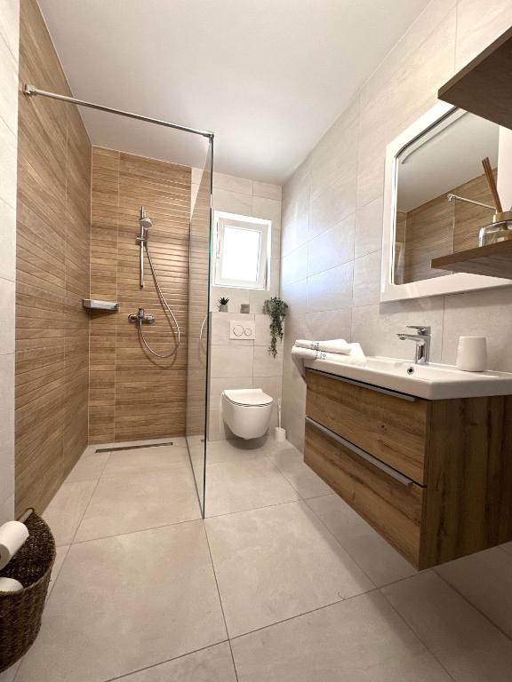 Kúpeľňa v ubytovaní Apartmani Drago
