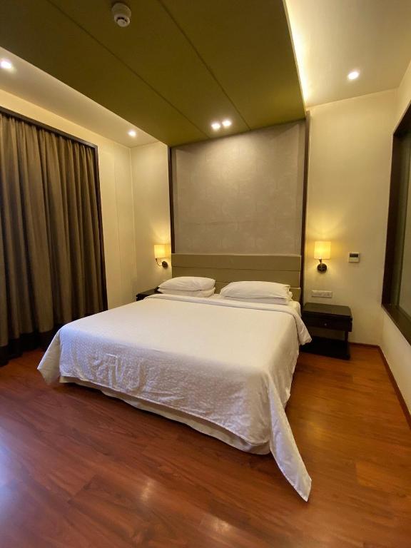 Postel nebo postele na pokoji v ubytování Four Points by Sheraton Srinagar