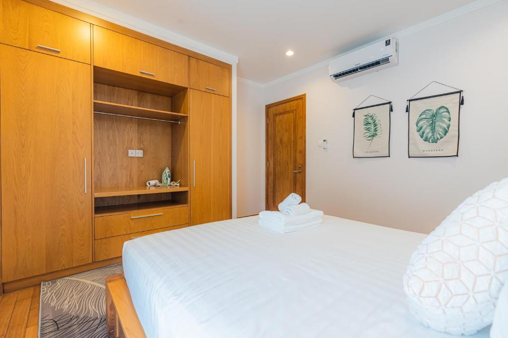 Postel nebo postele na pokoji v ubytování Sai Gon Pavillon Bà Huyện Thanh Quan Quận 3