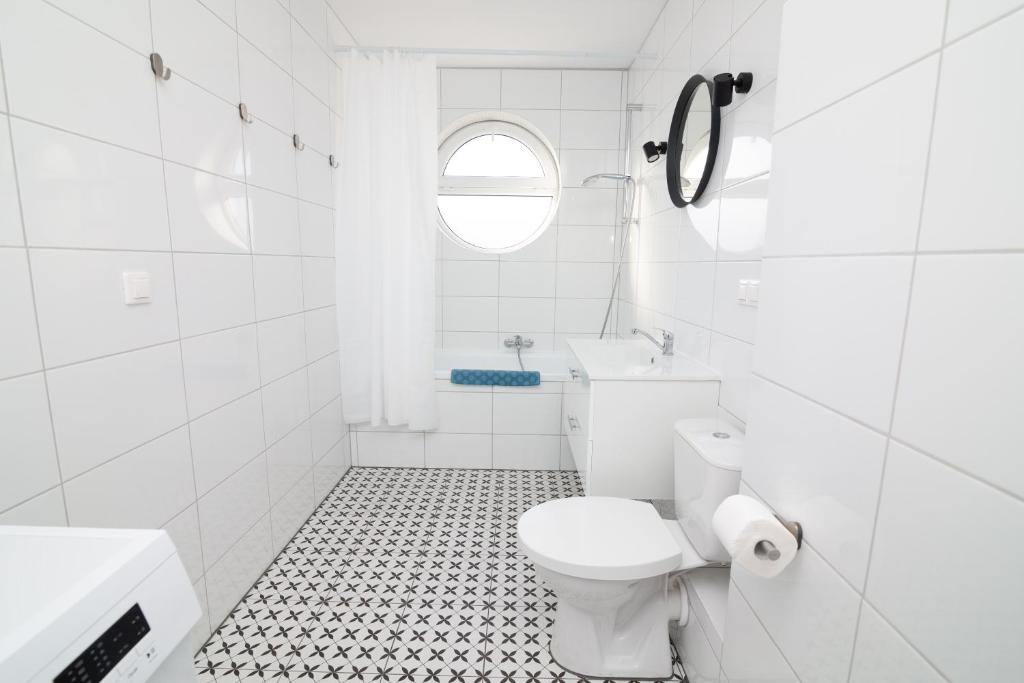 Kúpeľňa v ubytovaní Apartamenty 4YOU Hel