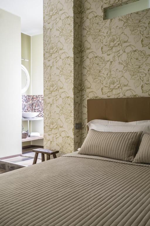 Posteľ alebo postele v izbe v ubytovaní Serendipity Rooms