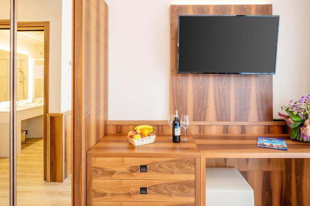 TV a/nebo společenská místnost v ubytování Hotel Centrale
