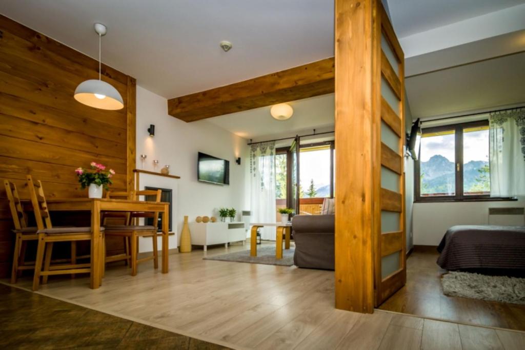 Posedenie v ubytovaní Mountain Apartments Butorowy Sauna Residence