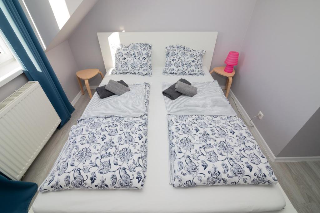 Posteľ alebo postele v izbe v ubytovaní Apartamenty 4YOU Hel