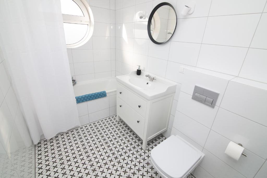 Kúpeľňa v ubytovaní Apartamenty 4YOU Hel