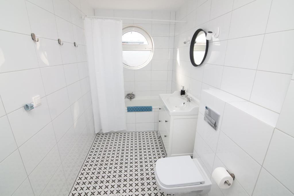 Kúpeľňa v ubytovaní Apartamenty 4YOU Hel