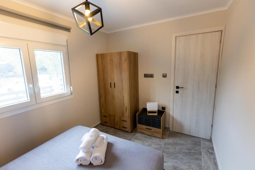 Postel nebo postele na pokoji v ubytování K&M Villas