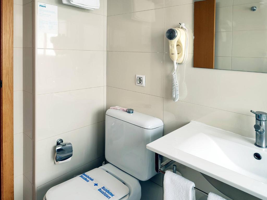 Koupelna v ubytování Hotel Porto