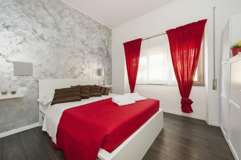 A bed or beds in a room at De Guestibus