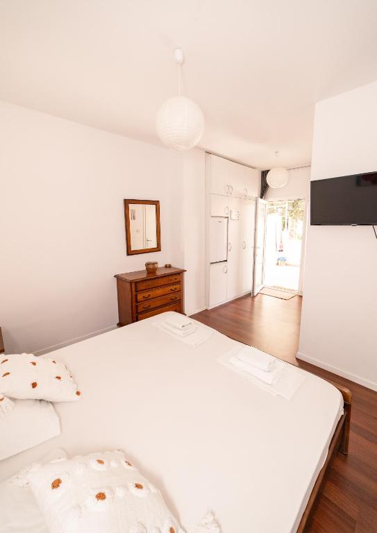 Postel nebo postele na pokoji v ubytování Guesthouse Lastavica