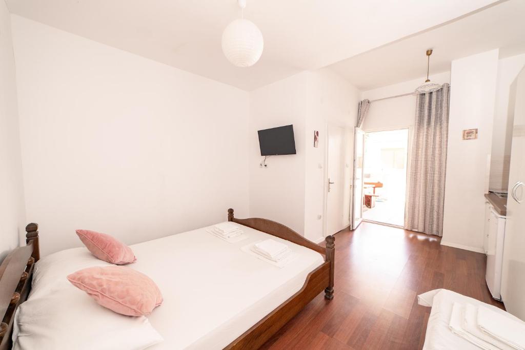 Postel nebo postele na pokoji v ubytování Guesthouse Lastavica