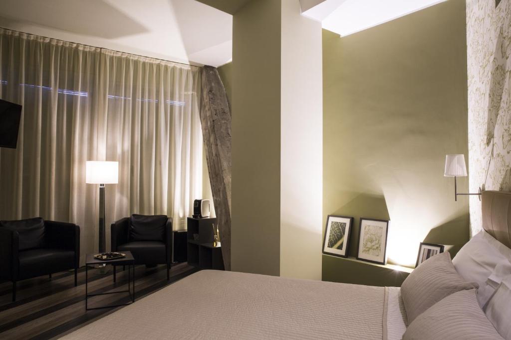 Posteľ alebo postele v izbe v ubytovaní Serendipity Rooms