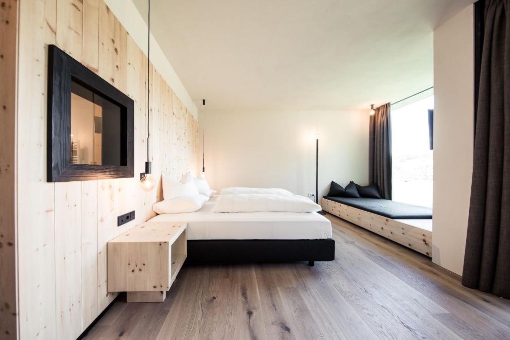Letto o letti in una camera di Green Luxury Hotel Pfösl