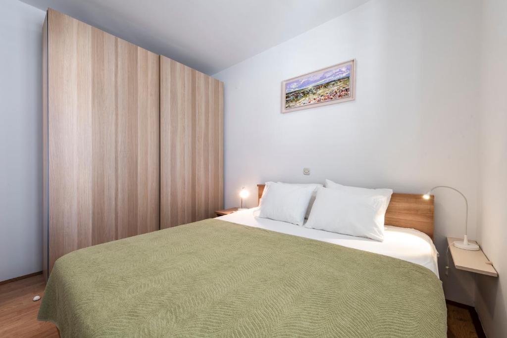 Posteľ alebo postele v izbe v ubytovaní Apartment Soulmate
