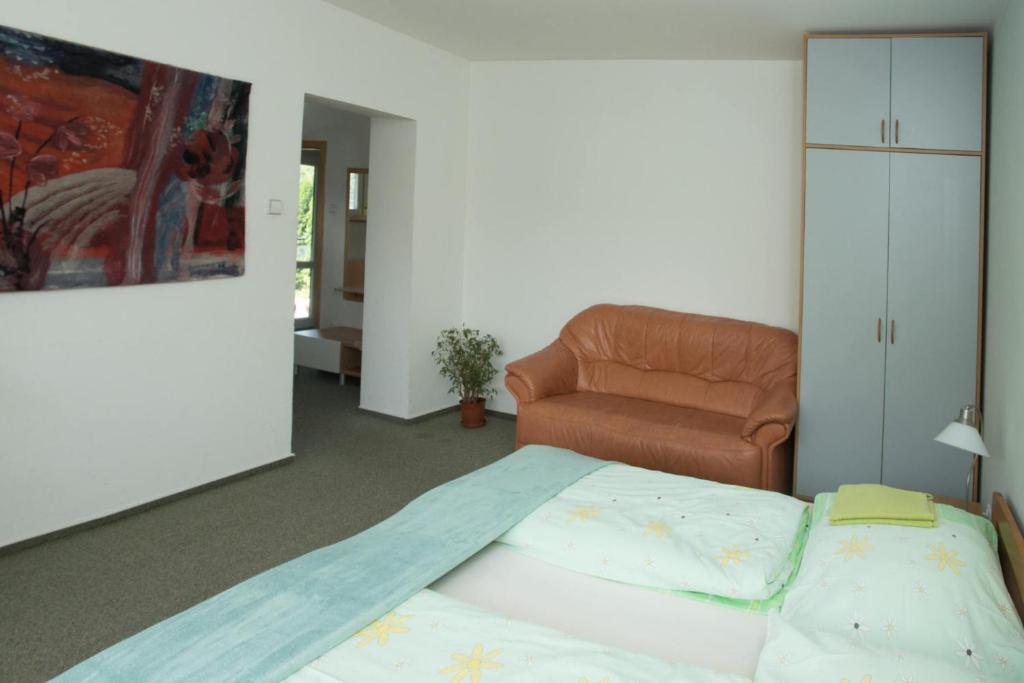 Postel nebo postele na pokoji v ubytování Penzion Garni
