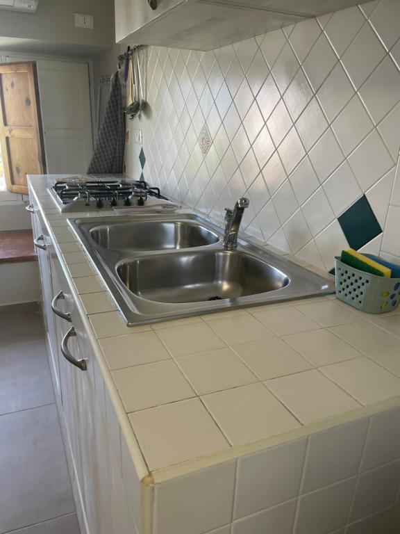 Kuchyň nebo kuchyňský kout v ubytování SOPRAMARE BB - APPARTAMENTI