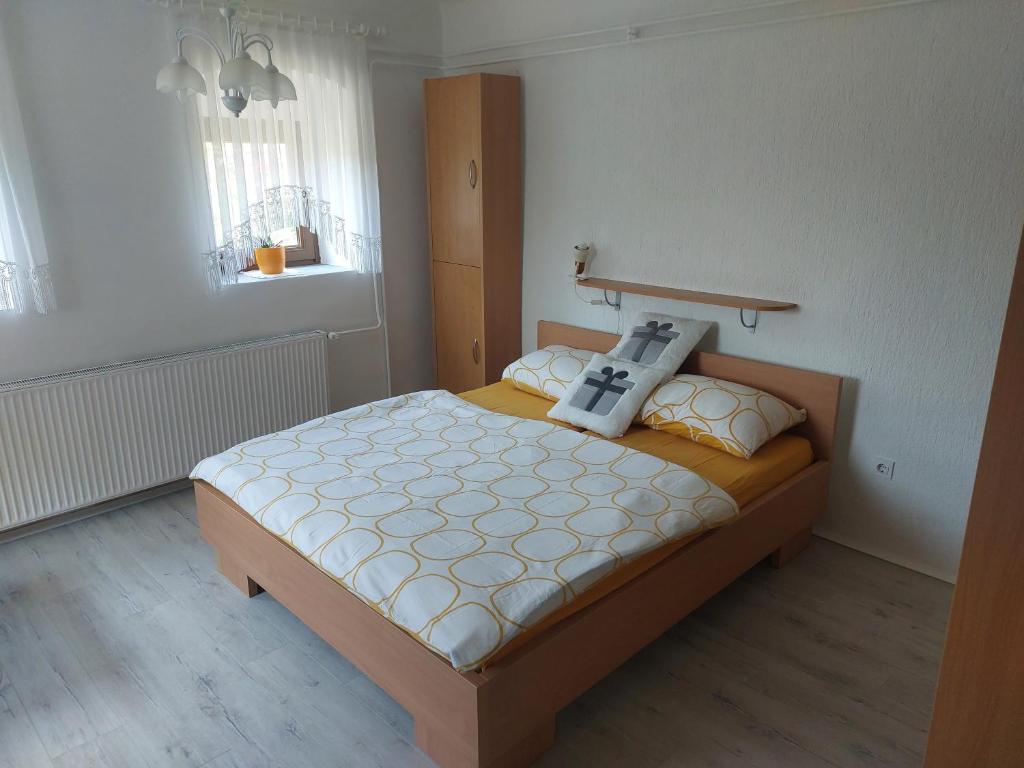 Postel nebo postele na pokoji v ubytování Apartma Vida