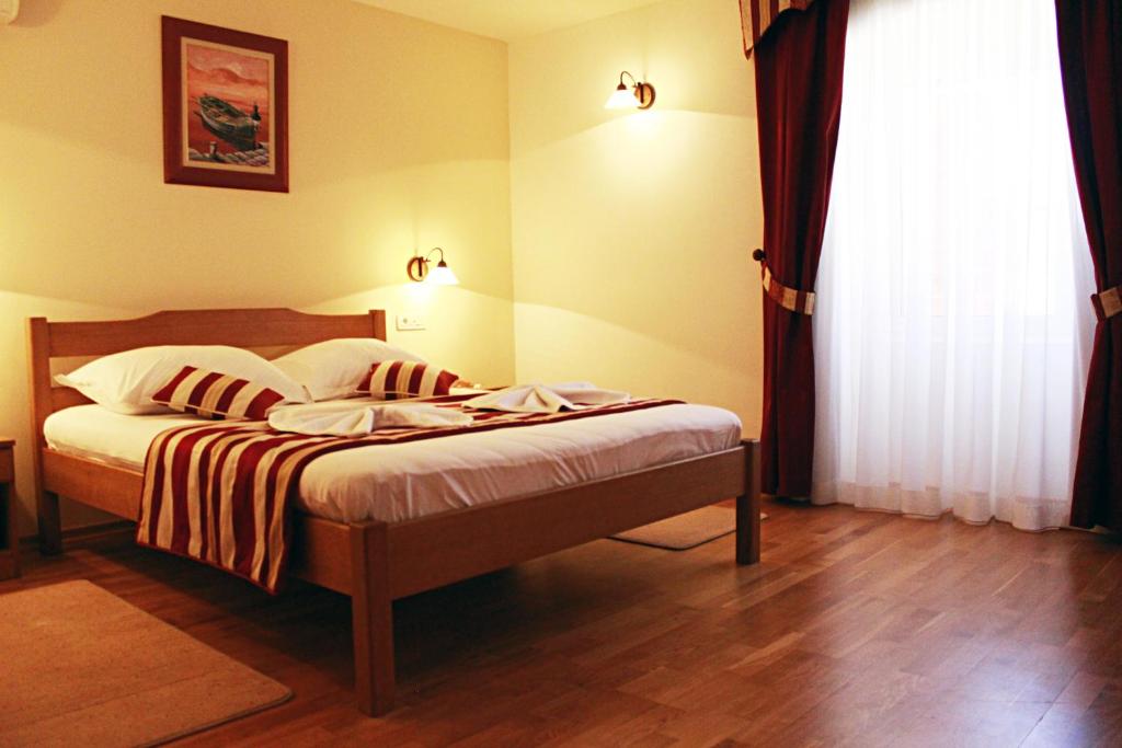 Posteľ alebo postele v izbe v ubytovaní Villa Kula
